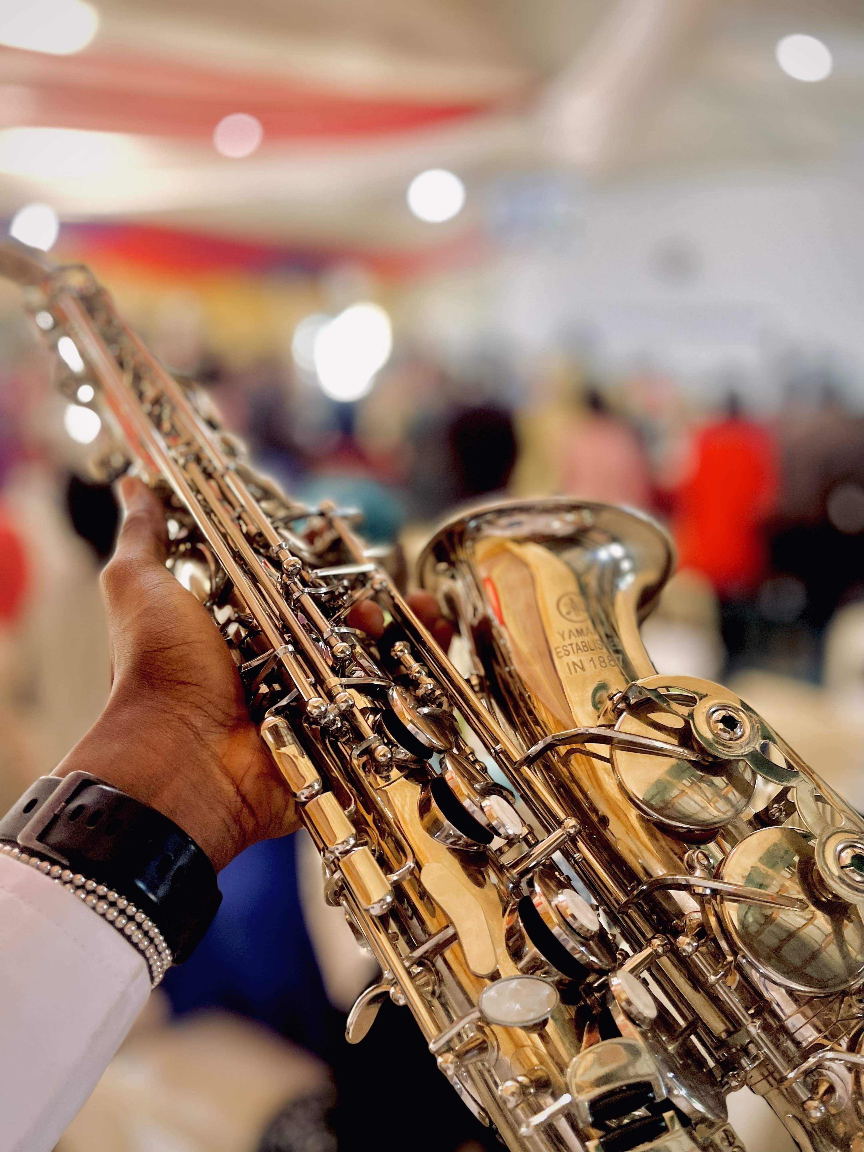 Close-up of a saxophone held in performance
